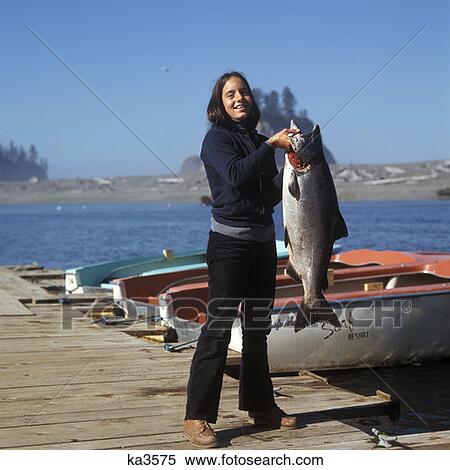 Teenage Girl Retro 1970 1970S Holding Large Fish Fishing View Large Photo Image Stock Photography - Teenage Girl Retro 1970 1970S Holding Large Fish Fishing. Fotosearch