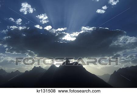 Teton National Park, Wy Sun'S Rays Over Grand Teton At Sunset Snake River Overlook View Large Photo Image Stock Photo - Teton National Park, Wy Sun'S Rays Over Grand Teton At Sunset Snake River Overlook. Fotosearch