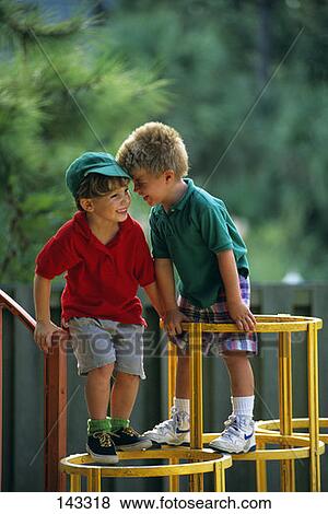 Two Boys On Jungle Gym View Large Photo Image Stock Photo - Two Boys On Jungle Gym. Fotosearch