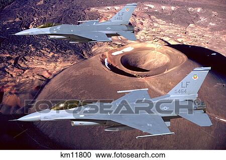 Two Usaf F-16 Falcons Flying Over Crater View Large Photo Image Stock Image - Two Usaf F-16 Falcons Flying Over Crater. Fotosearch