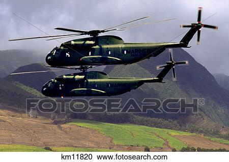 Two Usmc Ch-53 Sea Stallion Helicopters Flying By Mountains View Large Photo Image Stock Image - Two Usmc Ch-53 Sea Stallion Helicopters Flying By Mountains. Fotosearch