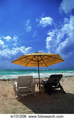 Stock Photo - Umbrella And Chairs On Caribbean Beach Playa Del Carmen, Mexico. Fotosearch