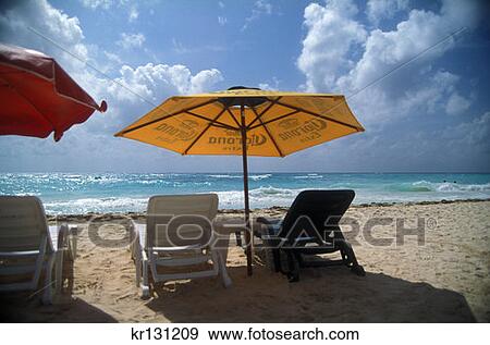 Umbrella And Chairs On Caribbean Beach Playa Del Carmen, Mexico View Large Photo Image Stock Photo - Umbrella And Chairs On Caribbean Beach Playa Del Carmen, Mexico. Fotosearch