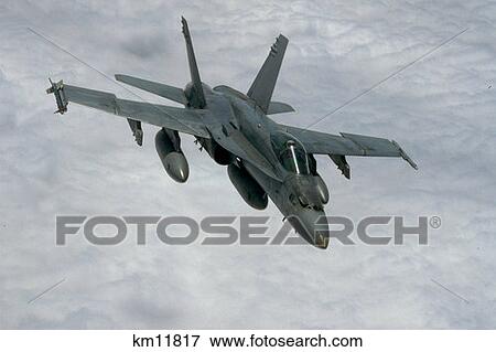 Usaf F 18 A Hornet Flying Over Clouds View Large Photo Image Stock Photo - Usaf F 18 A Hornet Flying Over Clouds. Fotosearch