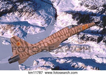 Usaf F-5E Tiger Ii Flying Over Snowy Mountains View Large Photo Image Stock Photo - Usaf F-5E Tiger Ii Flying Over Snowy Mountains. Fotosearch