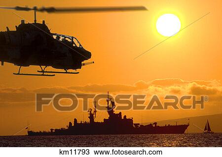 Usmc Ah-1 Sea Cobra Helicopter Flying At Sunset View Large Photo Image Stock Image - Usmc Ah-1 Sea Cobra Helicopter Flying At Sunset. Fotosearch