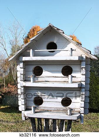 White Painted Wooden Two Story Birdhouse View Large Photo Image Stock Photograph - White Painted Wooden Two Story Birdhouse . Fotosearch