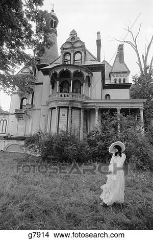 Woman In Victorian Costume Standing On Front Lawn Of Large Victorian Home View Large Photo Image Picture - Woman In Victorian Costume Standing On Front Lawn Of Large Victorian Home . Fotosearch