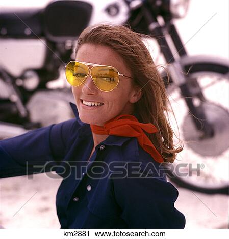 Woman Motorcyclist Smiling Yellow Sunglasses Red Scarf Mod 1970S 1970 Retro View Large Photo Image Stock Image - Woman Motorcyclist Smiling Yellow Sunglasses Red Scarf Mod 1970S 1970 Retro . Fotosearch