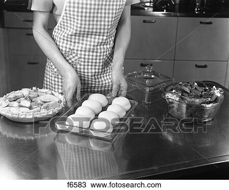 Woman Preparing Dinner Retro View Large Photo Image Stock Image - Woman Preparing Dinner Retro. Fotosearch