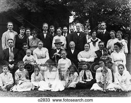 1910S Group Portrait Of Large Extended Family Outside In Front Of Home View Large Photo Image Stock Image - 1910S Group Portrait Of Large Extended Family Outside In Front Of Home . Fotosearch
