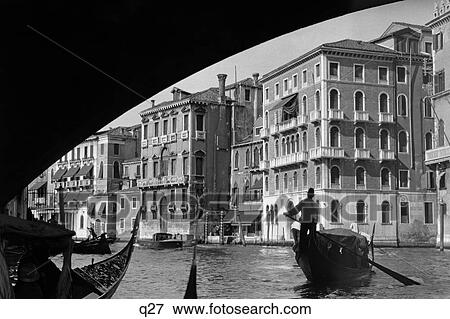 Stock Photo - 1920 1920S 1930 1930S Beneath Rialto Bridge Grand Canal Venice Italy Gondola . Fotosearch