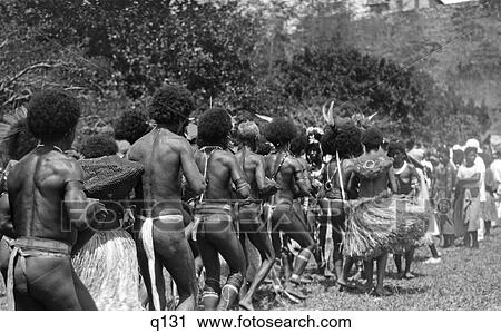 1920 1920S 1930 1930S Group Of Papuan Natives Dancing Port Moresby New Guinea Native Rythm Dance View Large Photo Image Stock Image - 1920 1920S 1930 1930S Group Of Papuan Natives Dancing Port Moresby New Guinea Native Rythm Dance . Fotosearch