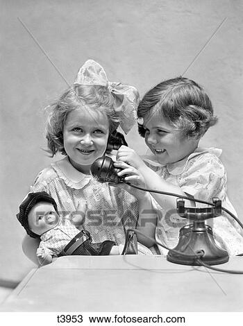 1920 1920S 1930 1930S Two Girls Playing Telephone View Large Photo Image Stock Image - 1920 1920S 1930 1930S Two Girls Playing Telephone . Fotosearch