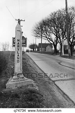 1920S 1930S Highway Marker Sign Maryland Pennsylvania Border Marking Mason Dixon Line Esso Gas Station Church Cars View Large Photo Image Picture - 1920S 1930S Highway Marker Sign Maryland Pennsylvania Border Marking Mason Dixon Line Esso Gas Station Church Cars . Fotosearch