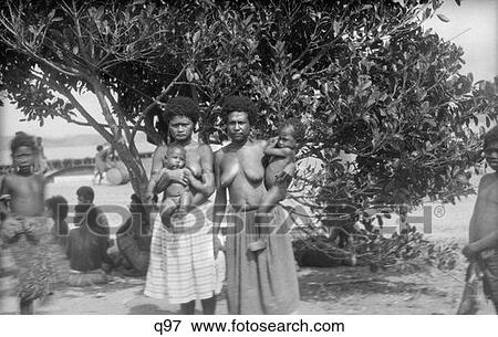 1920S 1930S Two Native Women Mothers Topless Wearing Skirts Holding Infant Children Babies View Large Photo Image Stock Photo - 1920S 1930S Two Native Women Mothers Topless Wearing Skirts Holding Infant Children Babies . Fotosearch