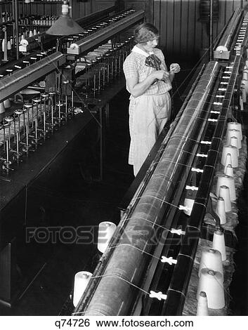 1920S 1930S Woman Worker Threading Bobbin Industrial Silk Winding Factory Philadelphia Pa Machine Textile Spools View Large Photo Image Stock Photograph - 1920S 1930S Woman Worker Threading Bobbin Industrial Silk Winding Factory Philadelphia Pa Machine Textile Spools. Fotosearch