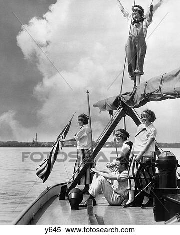 Stock Photography - 1920S 4 Women & 1 Man On Sailboat . Fotosearch