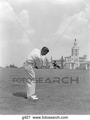 1930 1930S 1940 1940S Man Playing Golf Golfing Biltmore Hotel Miami Florida Men Travel Vacation Sport Sports Retro View Large Photo Image Stock Photo - 1930 1930S 1940 1940S Man Playing Golf Golfing Biltmore Hotel Miami Florida Men Travel Vacation Sport Sports Retro . Fotosearch