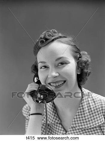 1930 1930S 1940 1940S Woman Smiling Talking On Telephone View Large Photo Image Stock Photography - 1930 1930S 1940 1940S Woman Smiling Talking On Telephone . Fotosearch