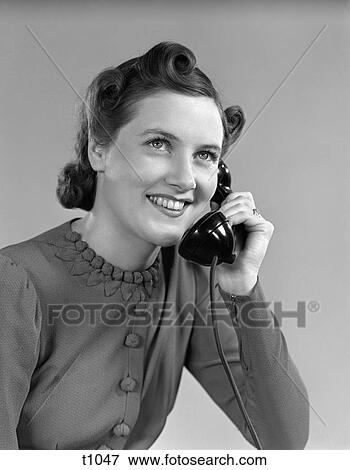 1930 1930S 1940 1940S Young Girl Talking On Telephone View Large Photo Image Stock Photo - 1930 1930S 1940 1940S Young Girl Talking On Telephone . Fotosearch
