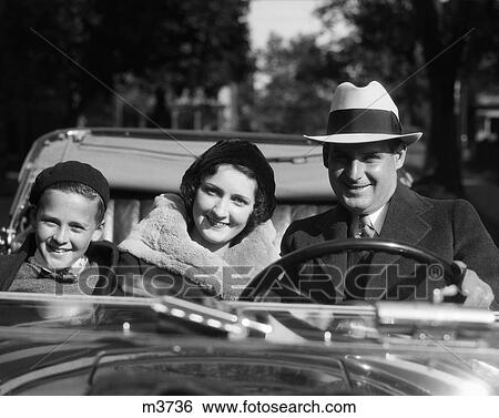 1930 1930S Family Car Man Woman Son Drive View Large Photo Image Stock Photograph - 1930 1930S Family Car Man Woman Son Drive . Fotosearch