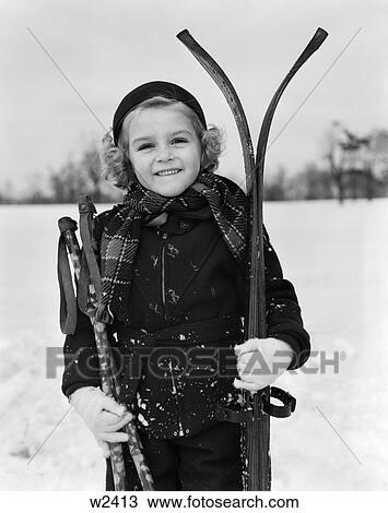 1930 1930S Little Girl Standing Holding Skis And Poles Smiling View Large Photo Image Stock Image - 1930 1930S Little Girl Standing Holding Skis And Poles Smiling . Fotosearch