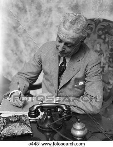 1930 1930S Man Business Desk Writing Tie Telephone View Large Photo Image Stock Photo - 1930 1930S Man Business Desk Writing Tie Telephone . Fotosearch