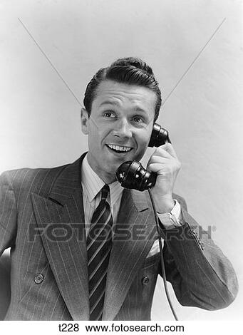 1930 1930S Man In Suit Talking On Telephone View Large Photo Image Stock Photo - 1930 1930S Man In Suit Talking On Telephone. Fotosearch