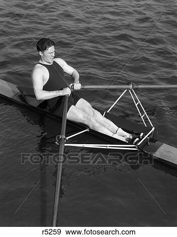 1930 1930S Man Rowning Sculling Holding Oars View Large Photo Image Stock Photo - 1930 1930S Man Rowning Sculling Holding Oars . Fotosearch