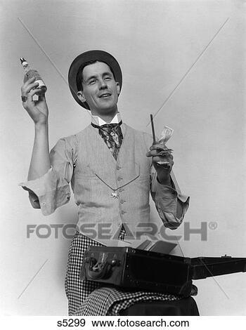 Stock Photo - 1930 1930S Man Selling Items From A Suitcase . Fotosearch