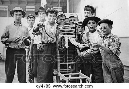 Stock Image - 1930 1930S Retro Boys Group Clothes Wringer Mangle. Fotosearch