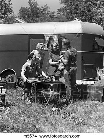 1930 1930S Retro Camping Trailer Couples Men Women Outdoors View Large Photo Image Picture - 1930 1930S Retro Camping Trailer Couples Men Women Outdoors . Fotosearch