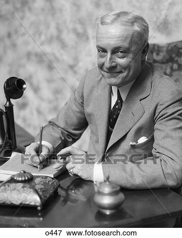 1930 1930S Retro Man Cigar Desk Suit Tie Pen Telephone Smile Business View Large Photo Image Stock Photo - 1930 1930S Retro Man Cigar Desk Suit Tie Pen Telephone Smile Business . Fotosearch