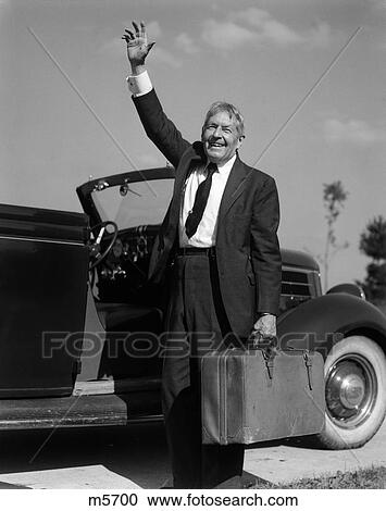 1930 1930S Retro Man Suitcase Luggage Wave Hand Suit Car Greeting View Large Photo Image Stock Image - 1930 1930S Retro Man Suitcase Luggage Wave Hand Suit Car Greeting . Fotosearch