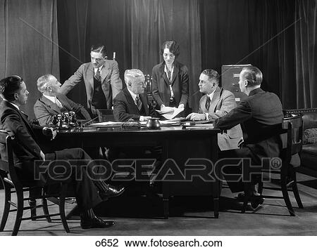1930 1930S Retro Men Woman Meeting Business Desk View Large Photo Image Stock Image - 1930 1930S Retro Men Woman Meeting Business Desk . Fotosearch