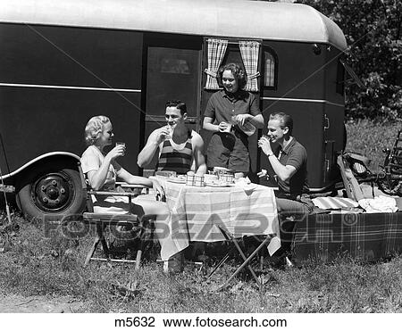 1930 1930S Retro Picnic Trailer Couples Men Women Camping View Large Photo Image Stock Image - 1930 1930S Retro Picnic Trailer Couples Men Women Camping . Fotosearch