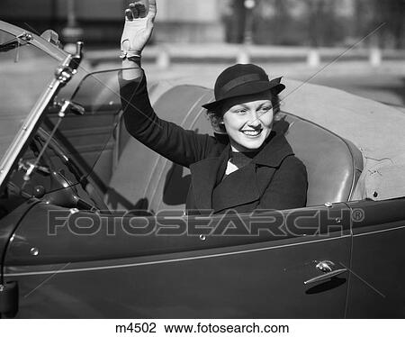 1930 1930S Retro Woman Wave Car Convetible Smile Hat View Large Photo Image Stock Image - 1930 1930S Retro Woman Wave Car Convetible Smile Hat . Fotosearch
