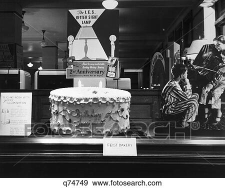 Stock Photo - 1930 1930S Window Display Electric Lamp Store 2Nd Anniversary Birthday Cake Retail Advertising Hackensack Nj. Fotosearch