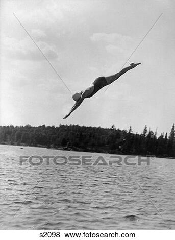 1930 1930S Woman Diving Into Lake View Large Photo Image Stock Photo - 1930 1930S Woman Diving Into Lake . Fotosearch
