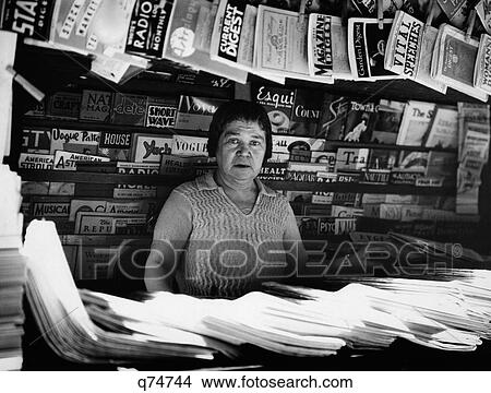 1930 1930S Woman Selling Magazines Nyc Sidewalk Newsstand News Stand Newspapers 42Nd Street Madison Avenue New York City Retro View Large Photo Image Picture - 1930 1930S Woman Selling Magazines Nyc Sidewalk Newsstand News Stand Newspapers 42Nd Street Madison Avenue New York City Retro. Fotosearch