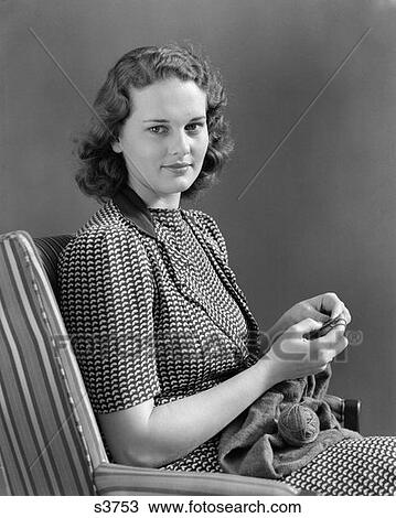 1930 1930S Woman Sitting In Chair Knitting View Large Photo Image Stock Image - 1930 1930S Woman Sitting In Chair Knitting . Fotosearch