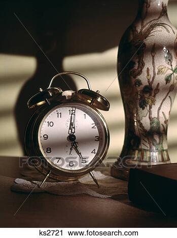 1930S 1940S 1950S 1960S Retro Nostalgia Mood Tabletop Of Alarm Clock And Lamp On Bed Table In Morning Sunlight Wake-Up View Large Photo Image Stock Image - 1930S 1940S 1950S 1960S Retro Nostalgia Mood Tabletop Of Alarm Clock And Lamp On Bed Table In Morning Sunlight Wake-Up. Fotosearch