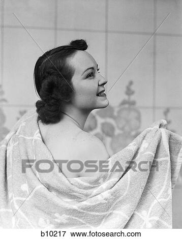 1930S 1940S Brunette Woman Drying Back With Towel View Large Photo Image Stock Photo - 1930S 1940S Brunette Woman Drying Back With Towel . Fotosearch