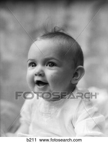 Stock Image - 1930S 5 Month Old Baby Smiling 3 4 Profile Happy . Fotosearch