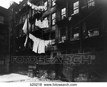 1930S Back Of Tenement Housing With Laundry Hanging Out On Clothesline View Large Photo Image Stock Photo - 1930S Back Of Tenement Housing With Laundry Hanging Out On Clothesline . Fotosearch