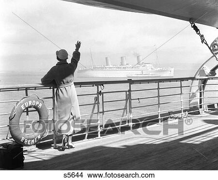 1930S Back Of Woman At Rail Of Cruise Ship Ss Europa View Large Photo Image Picture - 1930S Back Of Woman At Rail Of Cruise Ship Ss Europa . Fotosearch