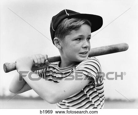 1930S Boy At Bat Wearing A Horizonal Striped Tee Shirt & Baseball Cap View Large Photo Image Stock Photo - 1930S Boy At Bat Wearing A Horizonal Striped Tee Shirt & Baseball Cap . Fotosearch