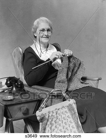 1930S Elderly Woman Sitting Knitting Wearing Pince-Nez Smiling View Large Photo Image Stock Photo - 1930S Elderly Woman Sitting Knitting Wearing Pince-Nez Smiling . Fotosearch