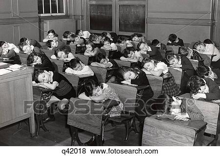 1930S Elementary Grade School Students Children Sleeping With Heads Resting On Their Desks View Large Photo Image Stock Photo - 1930S Elementary Grade School Students Children Sleeping With Heads Resting On Their Desks. Fotosearch
